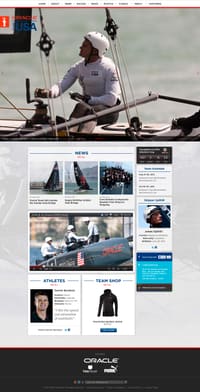 The Oracle Team USA fan hub, led by a full-width photograph of a helmsman aboard a racing catamaran.